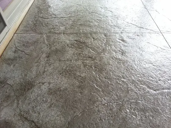 A detailed view of richly textured stamped concrete